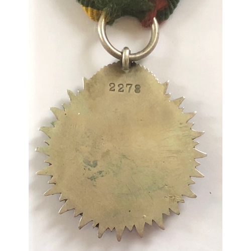 232 - Indian Recruiting Badge.   A good die-cast uniface unmarked silver crowned sun bearing circlet For R... 