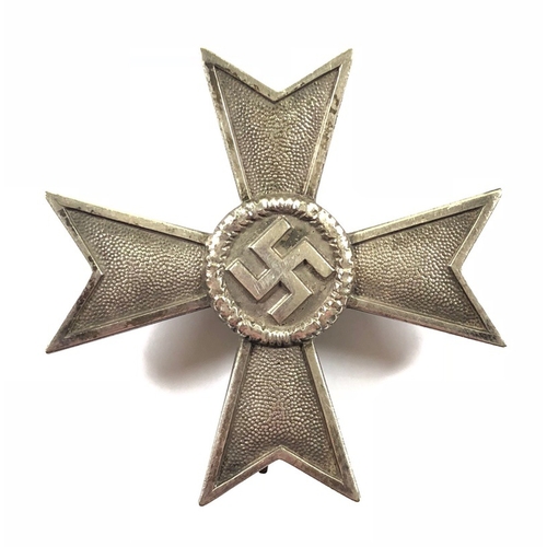 German Third Reich 1939 War Merit Cross 1st Class without swords by Friedrich Orth, Wien.   Good die-cast silvered example with tapered pin impressed 15. Minor  service wear.