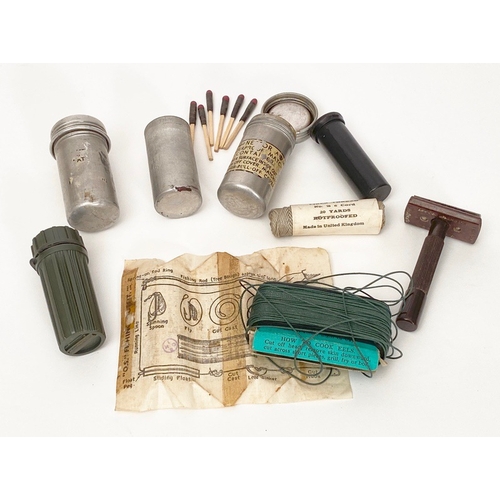 RAF Beadon Flying Suit Escape and Evasion Items Plus Others.   Comprising 2 x match alloy boxes, still with some matches and part label to one.  Fishing kit possibly from an escape kit, razor etc (7 items)
