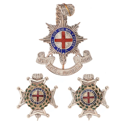 71 - Royal Sussex Regiment Officer's cap badge and pair of collars badges. Fine die-cast silver red and b... 