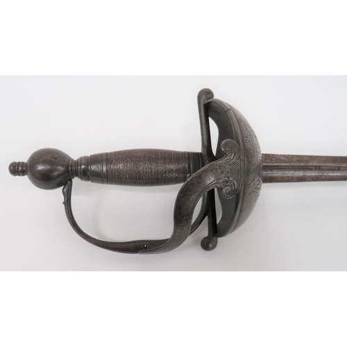 1 - 17th Century European Semi Cup Hilt Rapier
31 3/4 inch, double edged narrow blade.  Short central fu... 