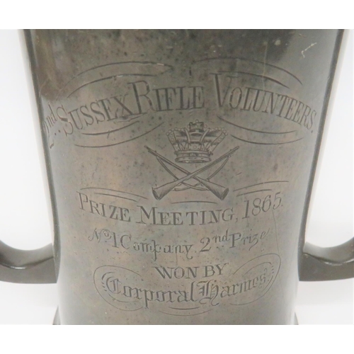 210 - 2nd Sussex Rifle Volunteers 1865 Prize Tankard
large pewter, double handled tankard.  The front... 