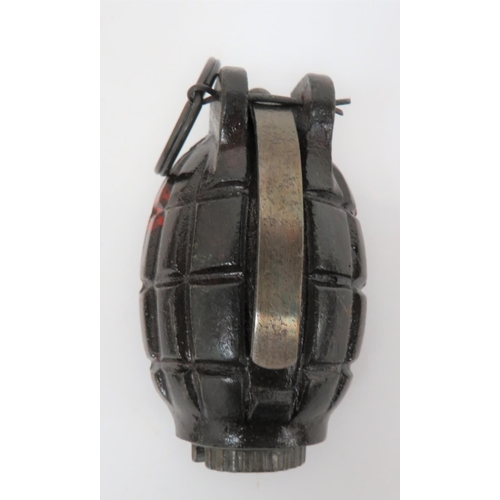 231 - Inert No 36 MKI Hand Grenade
brown lacquered fragmentation body with maker 