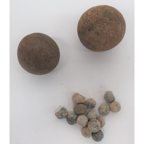 Scarce 17th Century Stone Round/Grape Shot
consisting 2 x stone balls approx. 2 inch and 1 3/4 inch.  Still retaining their shape.  Together with small selection of lead balls (shrapnel shot).  
Stone balls excavated River Wyre Lancashire.  