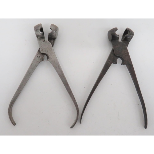 250 - Two Mid 19th Century Steel Bullet Moulds
steel ball pincer moulds.  The arm with central sprue ... 