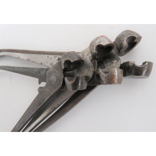 252 - Three Mid 19th Century Bullet Moulds
steel ball pincer moulds.  The arm with central sprue cutt... 