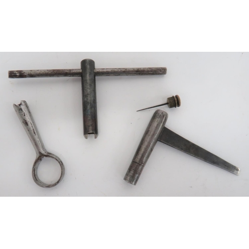 253 - Three Various Gun Tools
consisting steel barrel key with lower nipple key ... Steel T bar nipple key... 