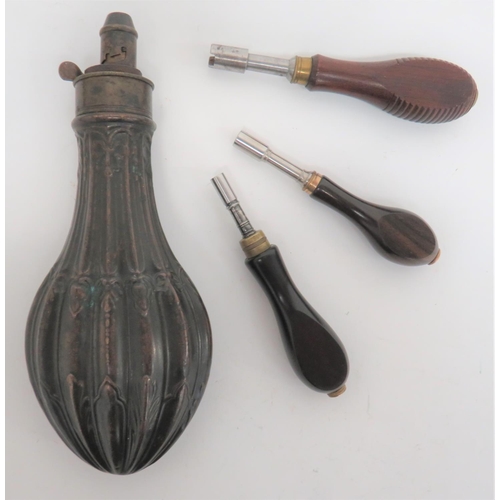 255 - Hawksley Powder Flask and Various Gun Tools
consisting a browned, fluted and foliage design flask. &... 