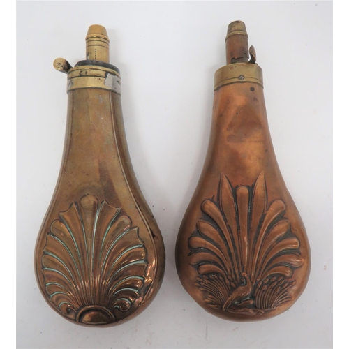 264 - Two Copper and Brass Powder Flasks
consisting copper body with lower shell design panel to both side... 