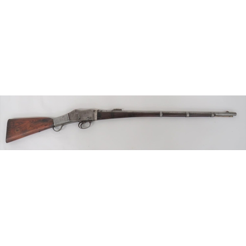 Obsolete Calibre North West Frontier Used Martini Rifle
.577/450, 28 inch barrel.  Front blade sight and rear ladder sight. Flat side body.  Falling block action.  Steel trigger guard and steel operating lever.  Military pattern, polished wooden butt with steel butt plate.  The wrist with silvered wire banding.  Chamfered down, full stock forend with silvered and steel plate bands.  Brass ramrod.  As used by North West Frontier tribal warriors.  
 