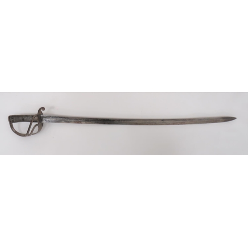 63 - 1853 Pattern Cavalry Trooper's Sword
35 1/4 inch, single edged, slightly curved blade with fuller. &... 