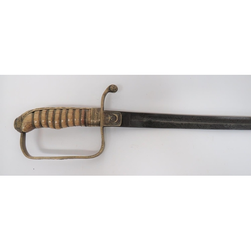 64 - Late 19th Century Turkish Officer's Sword
31 1/2 inch, single edged, slightly curved, narrow blade w... 