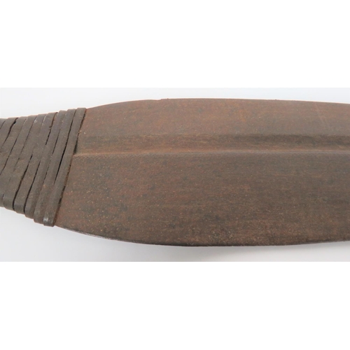 73 - 19th Century African Short Sword
22 inch, double edged, curved blade with offset fullers.  Stee... 