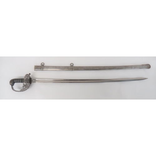 77 - Victorian 1887 Heavy Cavalry Officer’s Sword.
slightly curved, single edged, 35 inch blade with etch... 