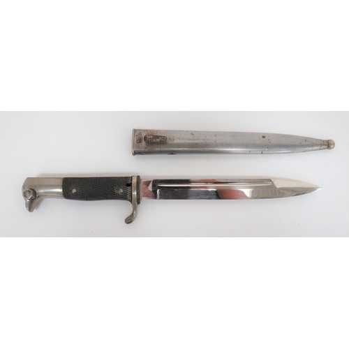 German K98 Carbine Length Dress Bayonet
7 3/4 inch, single edged, plated blade with sharpened back edge point.  Narrow fuller.  Forte with maker "A.W.JR Solingen".  Plated, turn up quillon crossguard.  Plated bird beak pommel.  Black composite, checkered slab grips.  Contained in its steel scabbard.  