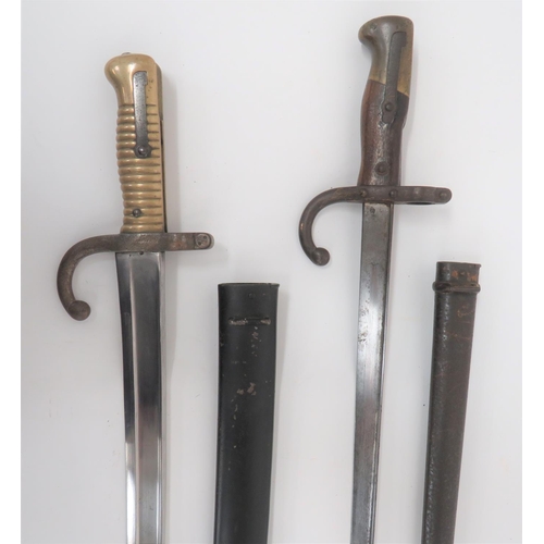 97 - Two French Bayonets
consisting chassepot bayonet.  22 1/2 inch, single edged, yataghan blade wi... 