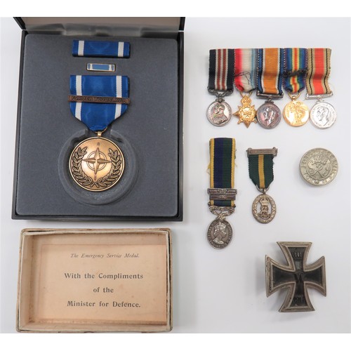 146 - Small Selection of Miniature Medals
consisting Military medal, 1915 Star trio and Defence medal, mou... 