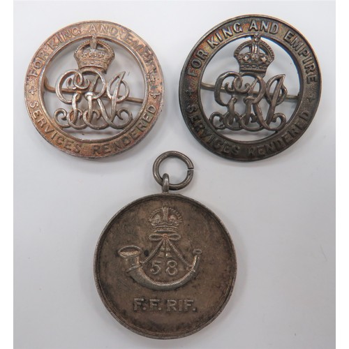 154 - Two WW1 Services Rendered Badges
circular, silver badges.  Rear brooch fitting.  Numbered 