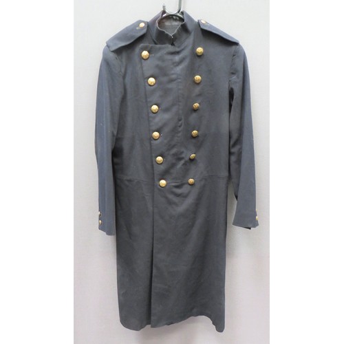 Post 1901 Officer's Double Breasted Coat
black melton cloth, double breasted, long coat.  High collar.  Removable shoulder straps with rank absent.  Brass, KC General List buttons.  Black quilted cotton lining.  Minor wear.  
