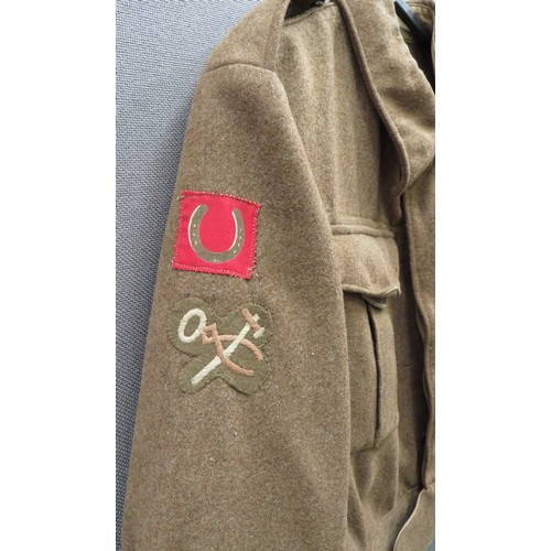 280 - 1937 Pattern 13th Division Battledress Jacket
khaki woollen, single breasted, closed collar, short j... 