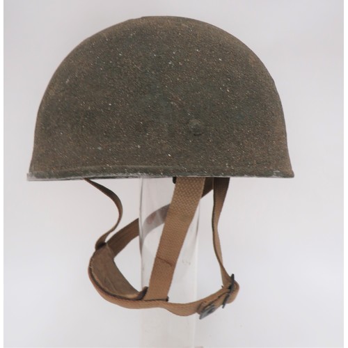Post War British Airborne Steel Helmet
green, rough texture, dome steel helmet.  Inner alloy band with sorbo rubber padding and leather and webbing crown harness.  Date rubbed but possibly 1953.  Khaki webbing, three point harness chinstrap with leather and chamois chin cup.  Some service wear.  