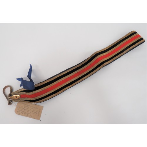 Yeoman Of The Guard Cross Belt
blue cotton backing with black and red facing, all with narrow gilt braid edging.  Lower, large brass dog lead clip.  Some wear.  Complete with maker's label.  