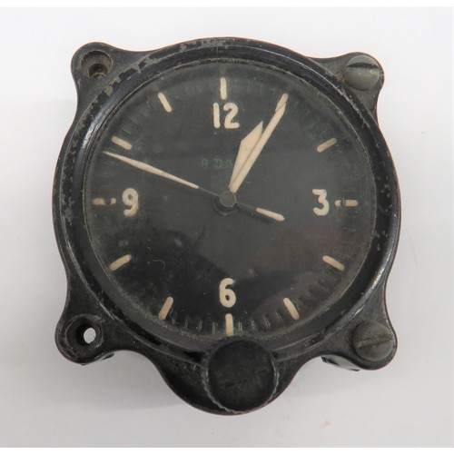 398 - 1941 Dated Air Ministry RAF 8 Day Dashboard Clock
black painted body with lower winding knob.  The f... 