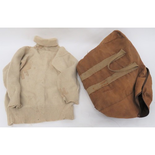 402 - RAF Parachute Bag and White Jumper
brown canvas bag with central securing zip.  Two webbing loop han... 