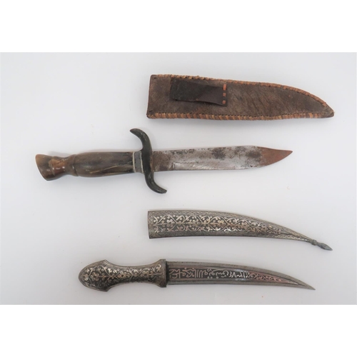 141 - Early 20th Century Indian Knife
5 3/4 inch, double edged blade. &nbsp;Central, silvered inlaid flora... 