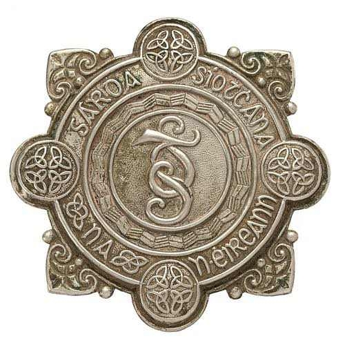 63 - Irish Police (Garda Siochana) helmet plate badge circa 1922-40.  Good scarce die-stamped white metal... 