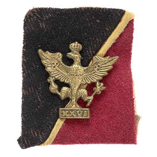 26th Hussars war raised cavalry WW2 1st pattern cap badge on pagri flash circa 1941.  Good scarce locally cast brass crowned eagle on XXVI tablet mounted on black and maroon clth rectangle with yellow through the diagonal divide. Light tan cotton lined with press studs.    Loops.  GC  Raised at Meerut in June 1941. Disbanded Bolarum, near Secunderabad, in October 1943.