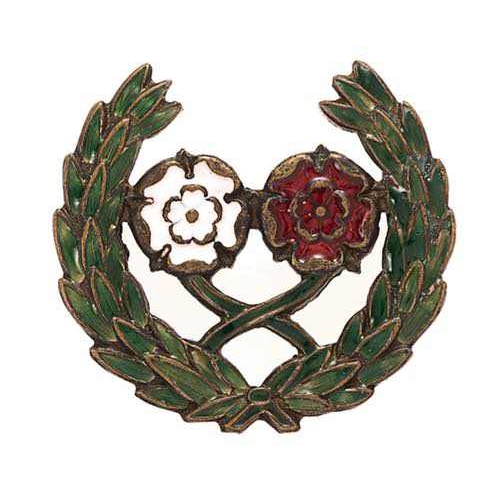 335 - 31st Division WW1 Battle Badge.  Good scarce die-cast brass enamelled crossed white and red roses wi... 