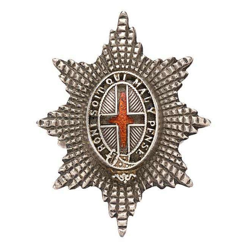 340 - Coldstream Guards Officer Service Dress silver cap badge.  Fine small facetted silvered star mounted... 