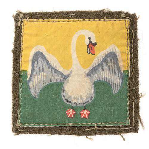 387 - O Force, Jordan cloth formation sign badge.  Good scarce white swan printed on yellow over green fin... 