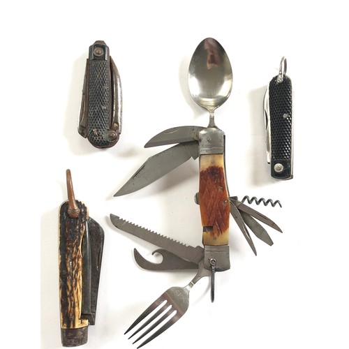 156 - Multi Tool Penknife and Others.An example of a multi tool bladed penknife including fork, spoon, saw... 