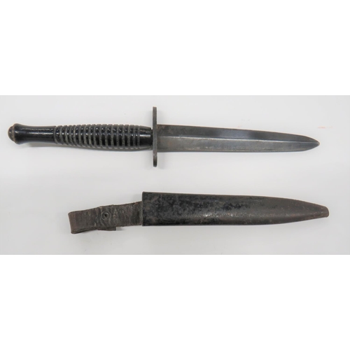 134 - WW2 F-S Wooden Handle RAF/Commando Knife
5 1/2 inch, double edged, shortened blade. &nbsp;Blued stee... 