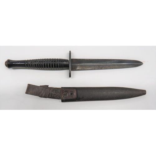 134 - WW2 F-S Wooden Handle RAF/Commando Knife
5 1/2 inch, double edged, shortened blade. &nbsp;Blued stee... 