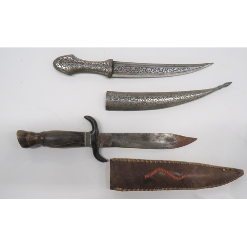 141 - Early 20th Century Indian Knife
5 3/4 inch, double edged blade. &nbsp;Central, silvered inlaid flora... 
