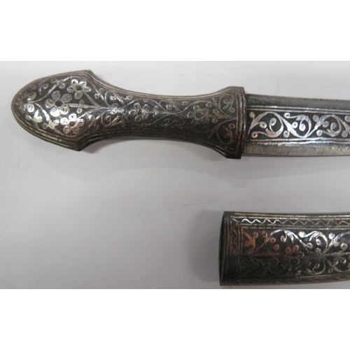141 - Early 20th Century Indian Knife
5 3/4 inch, double edged blade. &nbsp;Central, silvered inlaid flora... 
