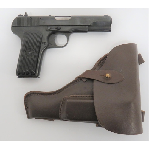 Deactivated Tokarev Auto Pistol
7.62 mm, 4.5 inch barrel.  Blackened top slide with blade foresight and rear V sight.  Blackened frame and trigger guard dated 1951. Black composite ribbed slab grips.  Removable magazine.Brown leather holster.  Complete with current deactivation cert.  