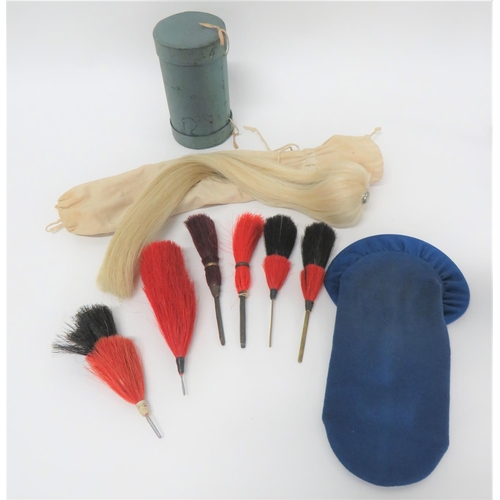 302 - Various Helmet/Hat Plumes
consisting white horsehair, Cavalry helmet plume, complete with securing s... 