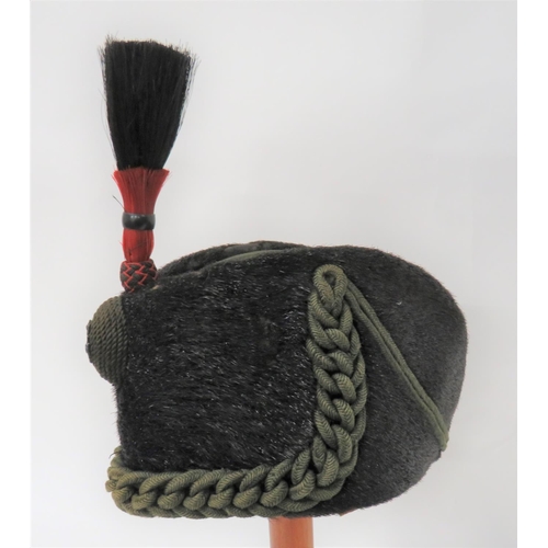 304 - Victorian Rifles Other Ranks Sealskin Cap
dark green felt crown.  Black sealskin body with green pla... 