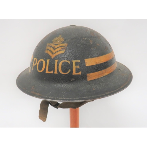 314 - 1939 Dated Police Station Sergeant MKII Steel Helmet
black/dark blue painted outer shell.  Transfer ... 