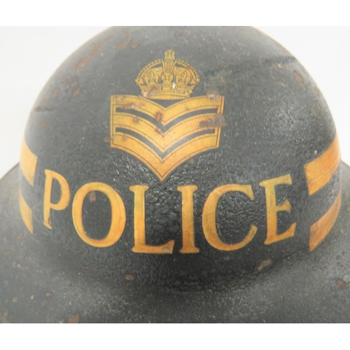 314 - 1939 Dated Police Station Sergeant MKII Steel Helmet
black/dark blue painted outer shell.  Transfer ... 