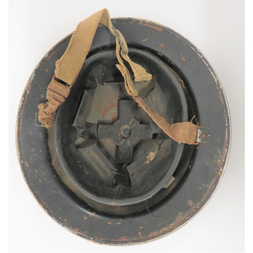 318 - 1940 Dated Senior Fire Guard MKII Steel Helmet
white overpainted black outer shell leaving a central... 