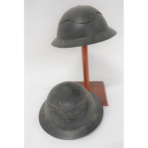 321 - Two WW2 Cromwell Pattern Fibre Helmets
black fibre, two piece crown with riveted joins. &nbsp;Inner ... 