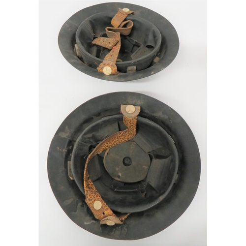 321 - Two WW2 Cromwell Pattern Fibre Helmets
black fibre, two piece crown with riveted joins. &nbsp;Inner ... 