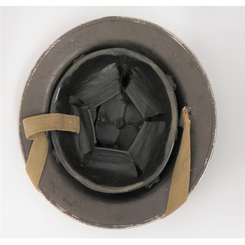 322 - 1943 Dated RAFP MKII Steel Helmet
green painted crown. &nbsp;Black and red crown band with RAFP to t... 