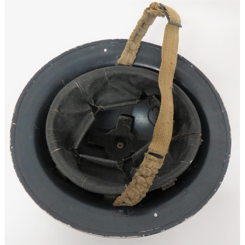 324 - 1940 Dated Police MKII Steel Helmet
blue painted crown. &nbsp;The front with white stencilled 