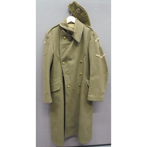 1939 Pattern Home Guard Essex Greatcoat
khaki woollen, double breasted, long greatcoat.  Large fold over collar.  Lower hidden pockets with plain flaps.  Both sleeves with printed Home Guard titles over "ESX.16".  Formation badges and braid Lance Corporal strips.  Brass, KC General List buttons.  Internal label "Greatcoat 1939 Pattern".  Together with a 1939 dated, field service cap with bi-metal Essex Regiment badge.  2 items